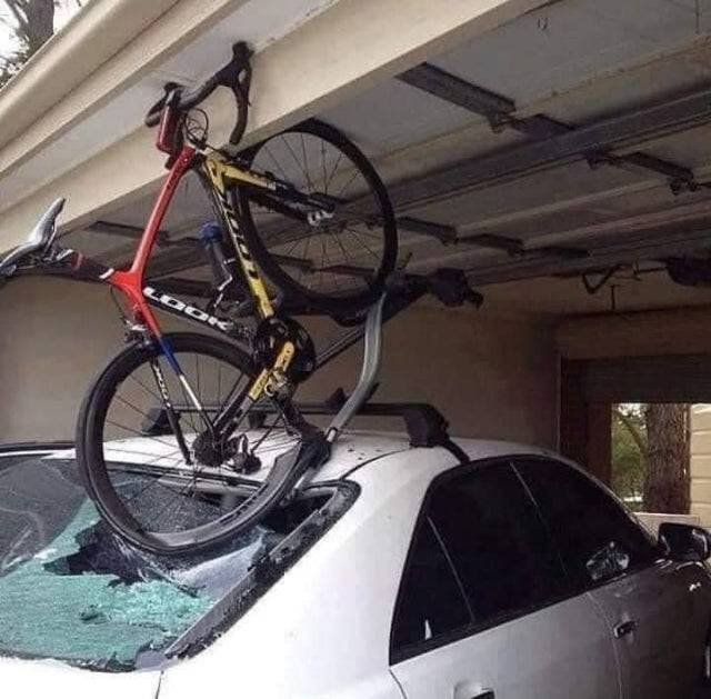 crushed bike on car