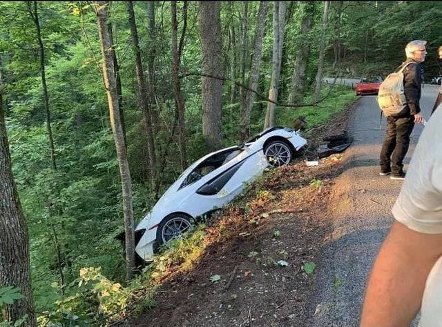expensive car down a ditch