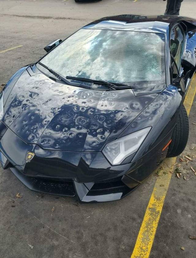 car with hail dents