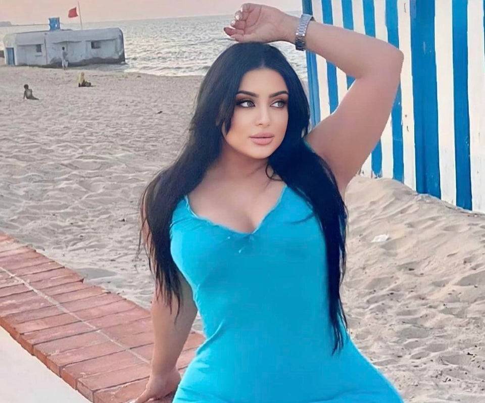 fake woman at the beach