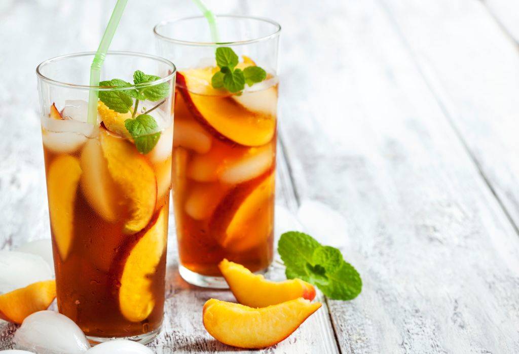 iced tea with peaches inside