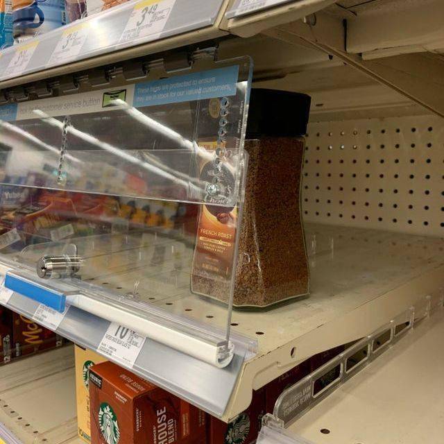 plastic screen over shelf that you can reach around