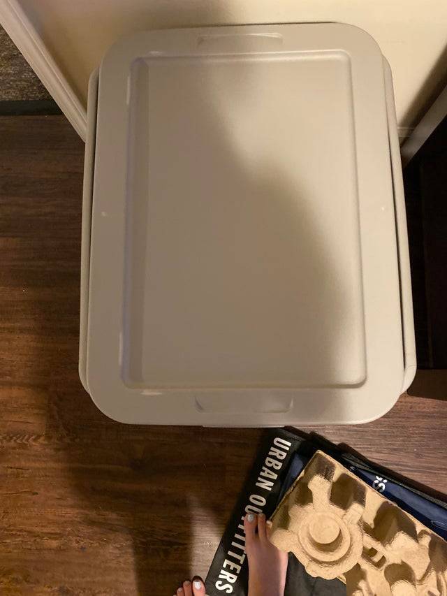 a lid that is too big for the bin it's on
