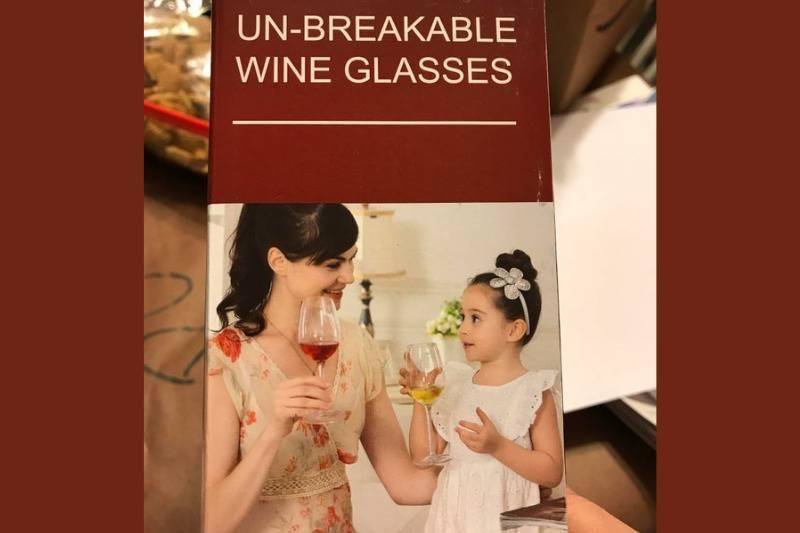 unbreakable wine glass ad shows child drinking