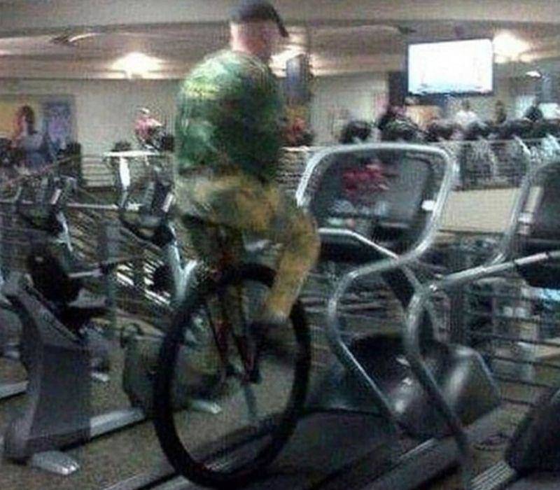 man running on unicycle on treadmill
