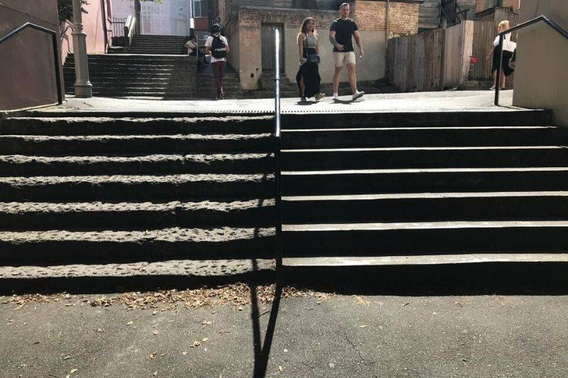 worn down staircase next to new one