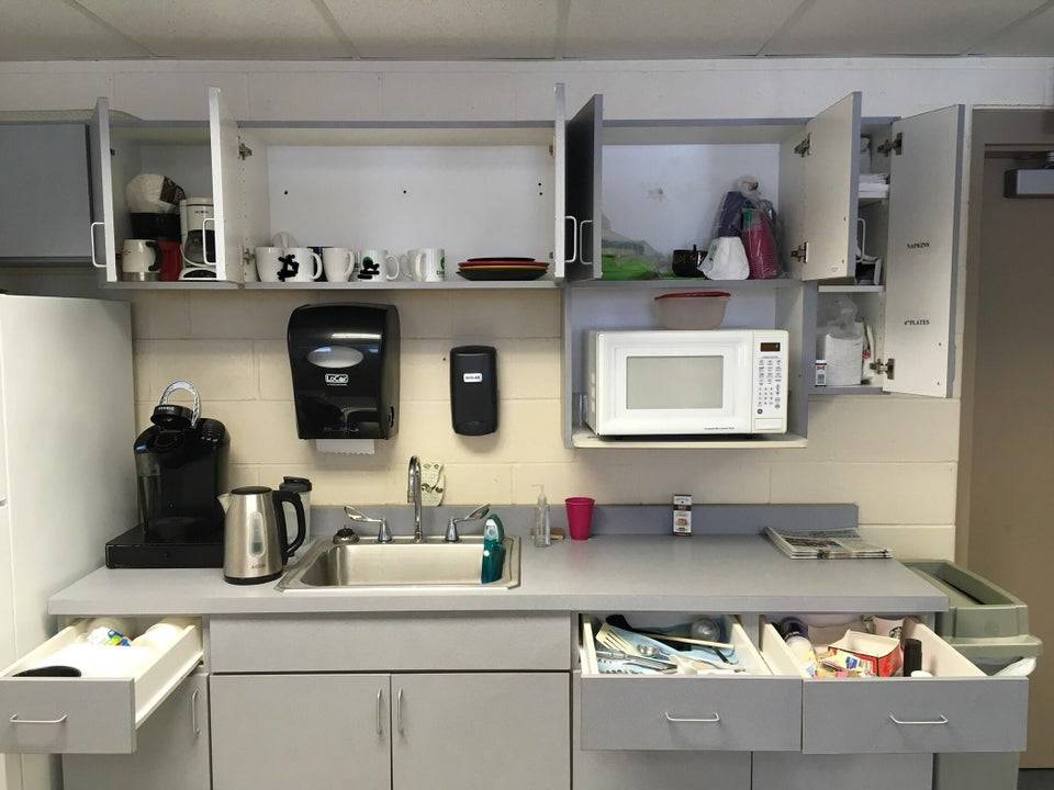 Petty coworker who left all the drawers and cupboard doors open in the employee break room open to annoy a coworker