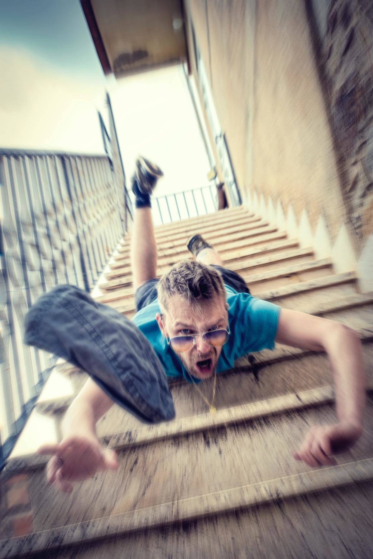 Man falling down the stairs