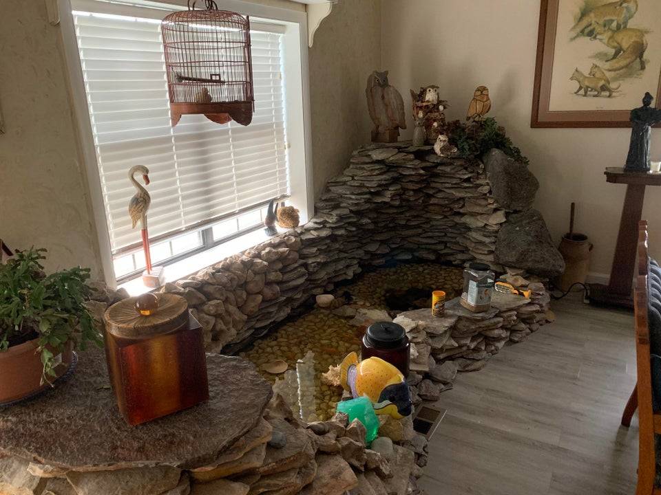 Large fish pond in family living room