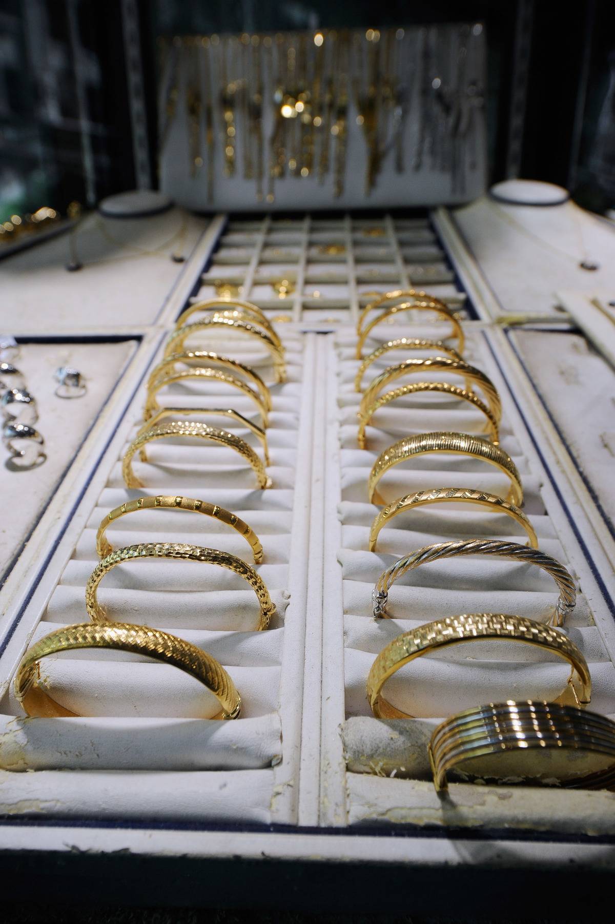 LOS ANGELES, CA - NOVEMBER 09: Gold rings, braclets and charms are on display for sale on November 9, 2010 in Los Angeles, California
