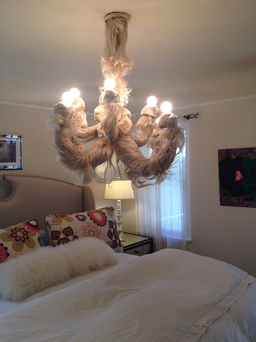 Chandelier wrapped in doll's hair