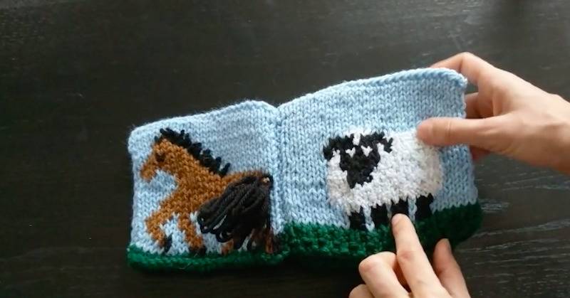 A woman knits a touchable baby book containing farm animals for her expectant coworker 