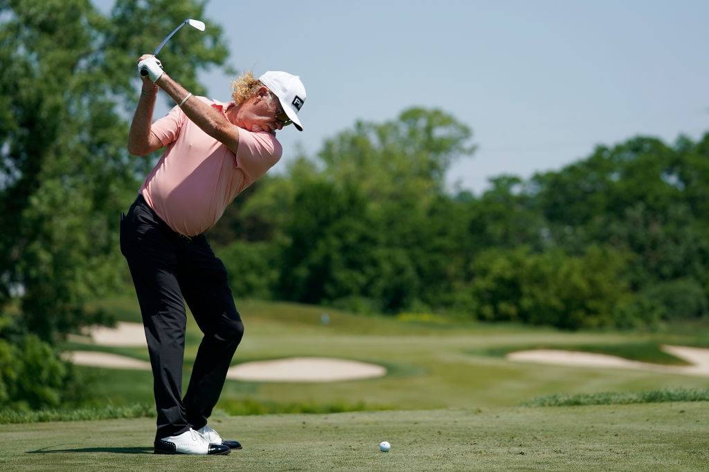Miguel Angel Jimenez of Spain hits his tee shot on the fifth hole in Madison, Wisconsin