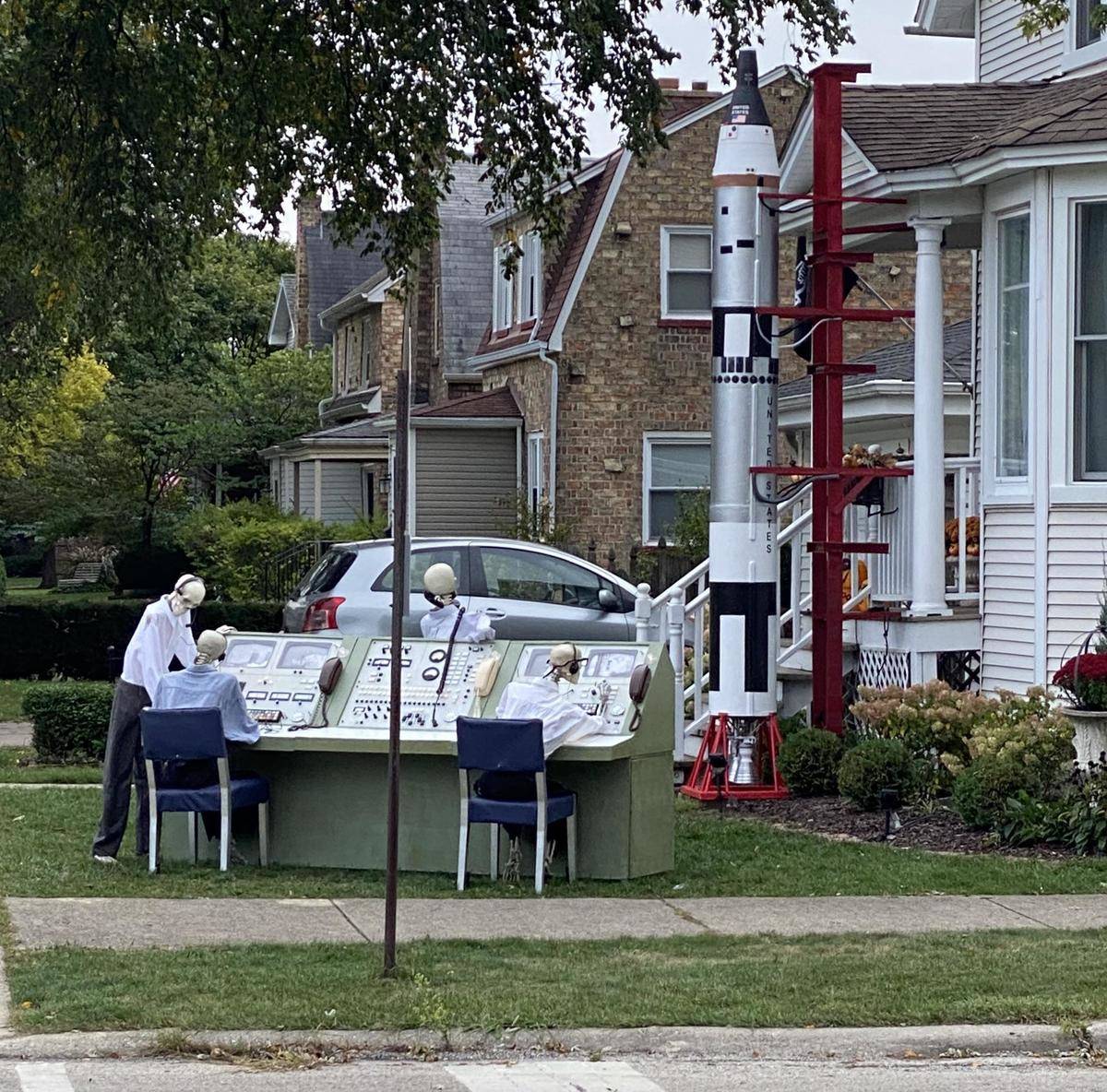 Rocket launch Halloween decorations command station with skeletons operating launch board