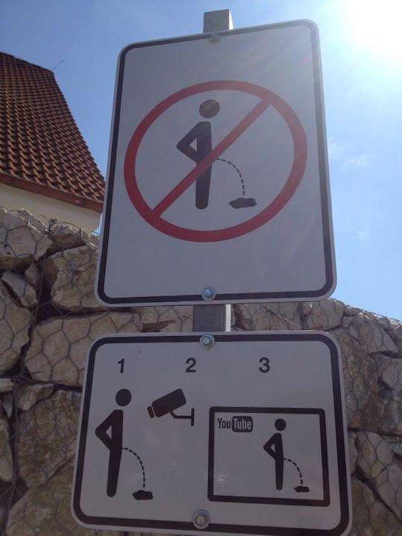 A sign in the Czech Republic which prevents people from public urination by threatening to upload the video to YouTube if people do it