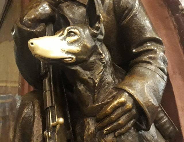 dog statue gold nose