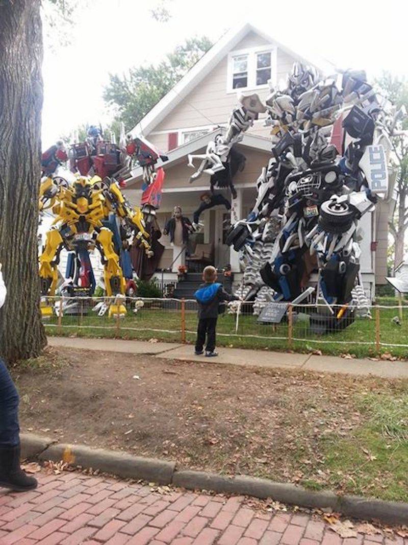 Transformers Halloween decorations, giant car robots on front lawn