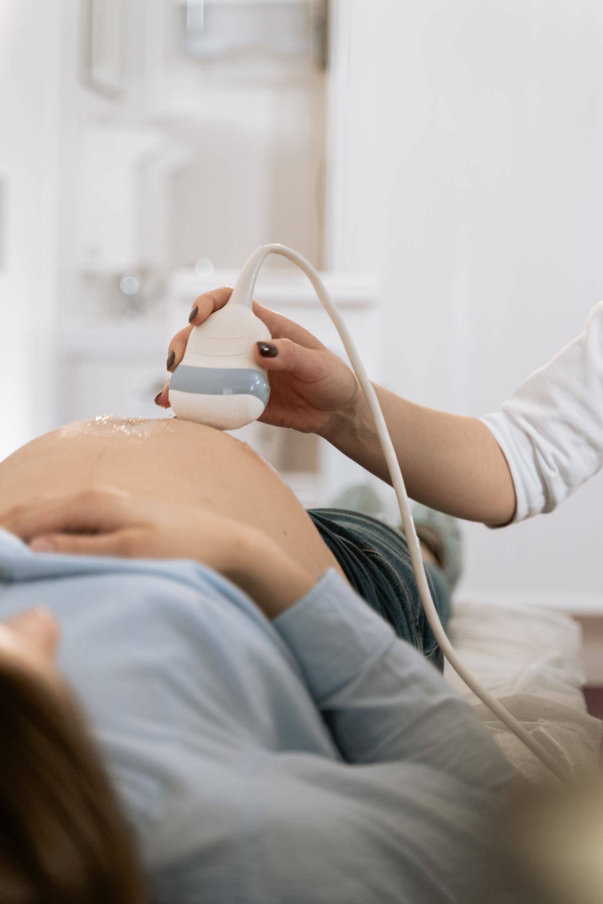 Pregnant woman undergoes an ultrasound 