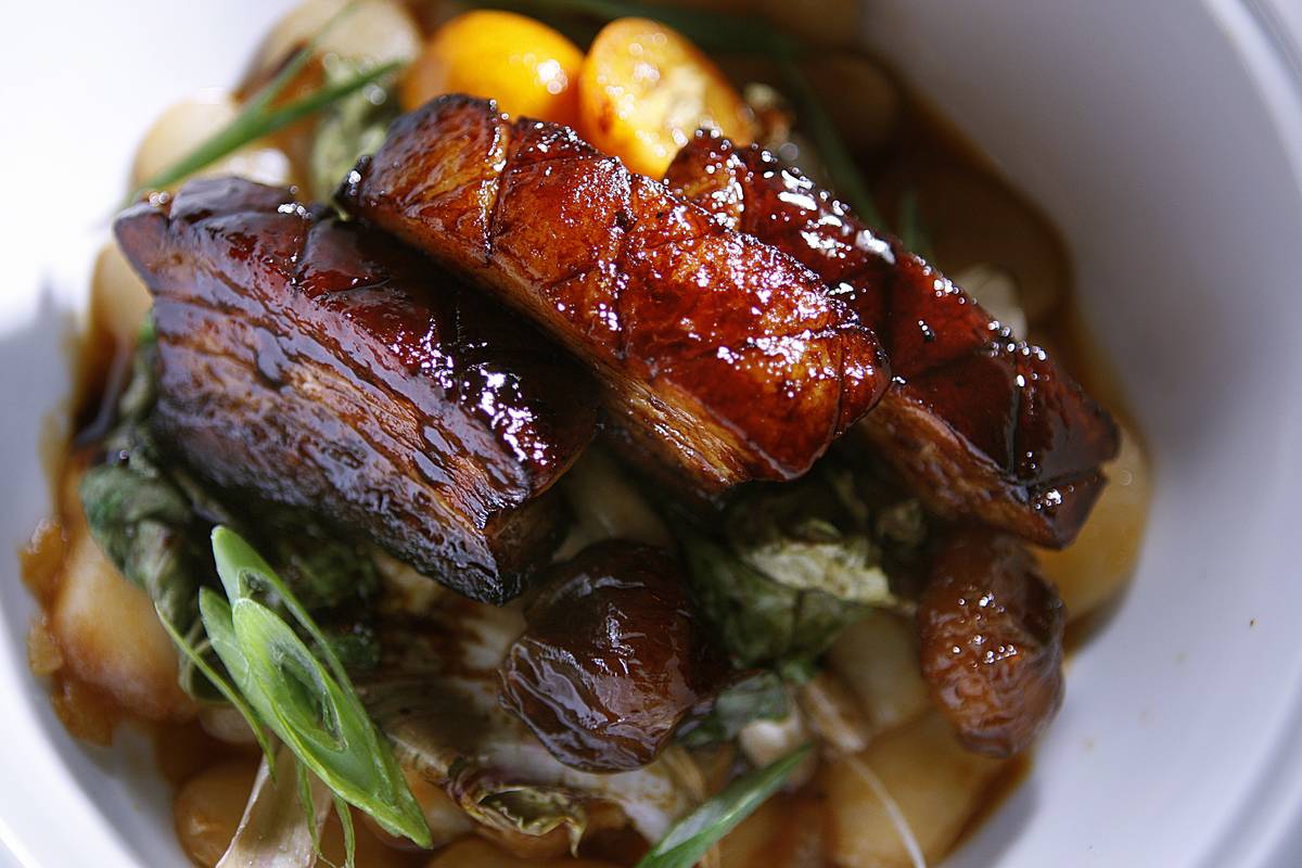BBQ pork and beans is served at a restaurant.