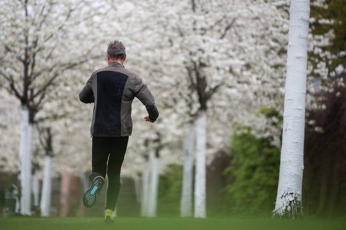 A man jogs outside.