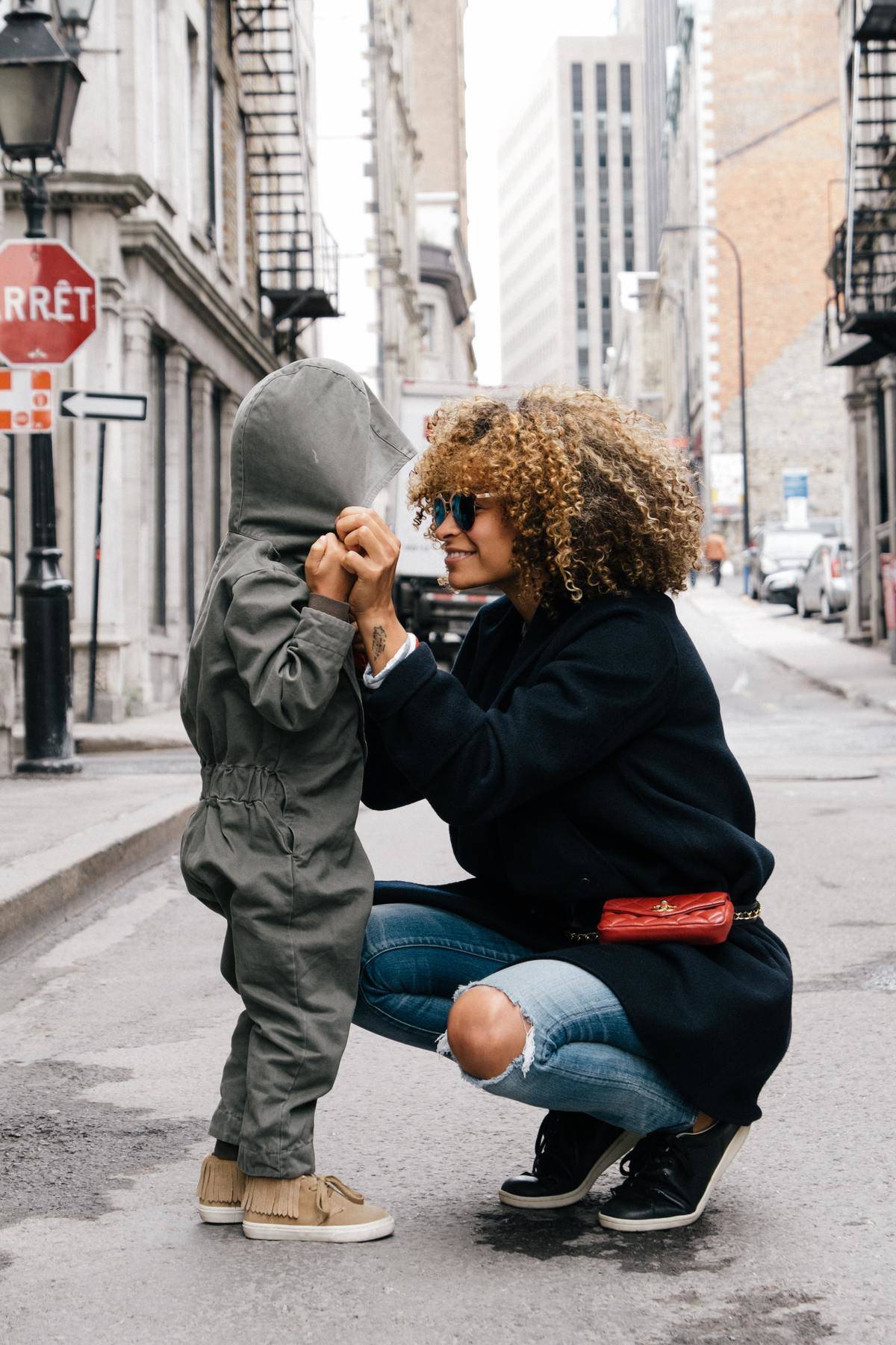 kid and mom on street