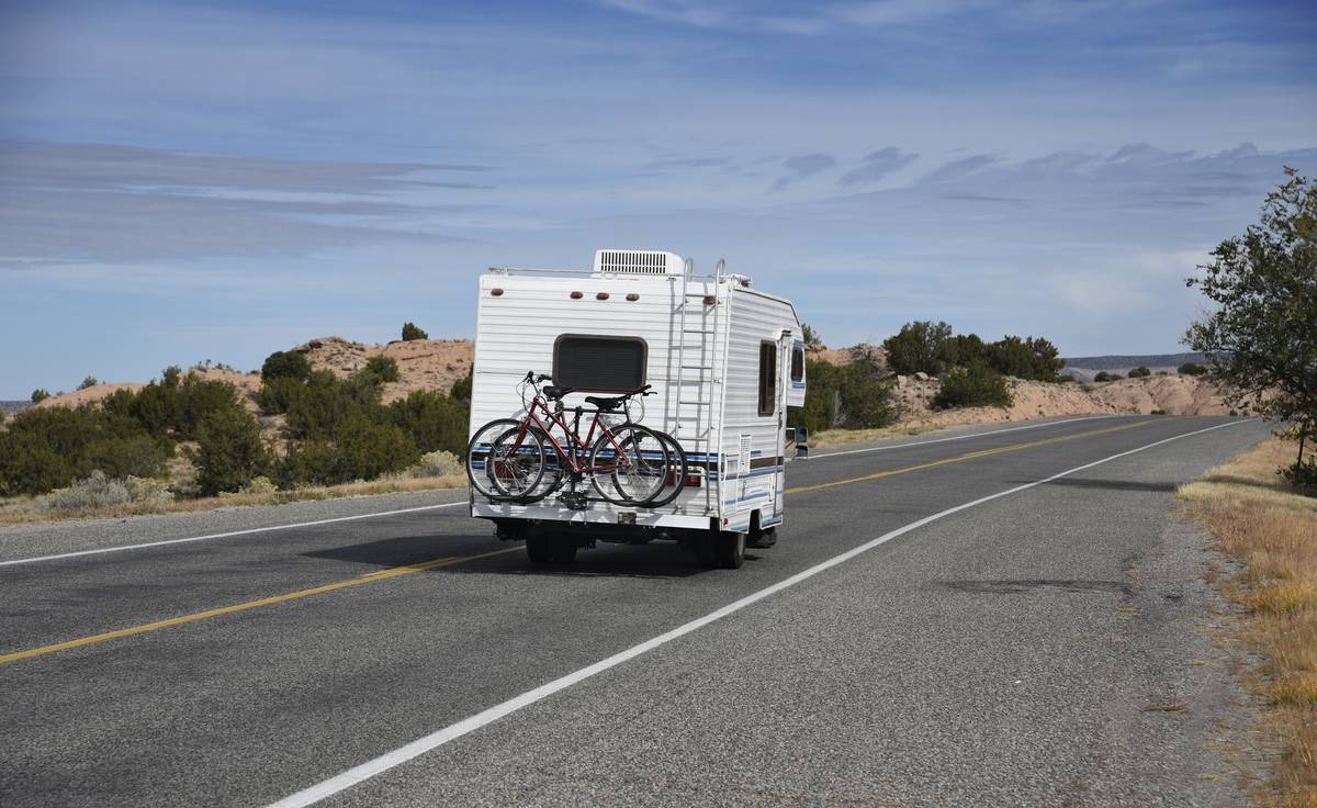 A mobile home drives through New Mexico.