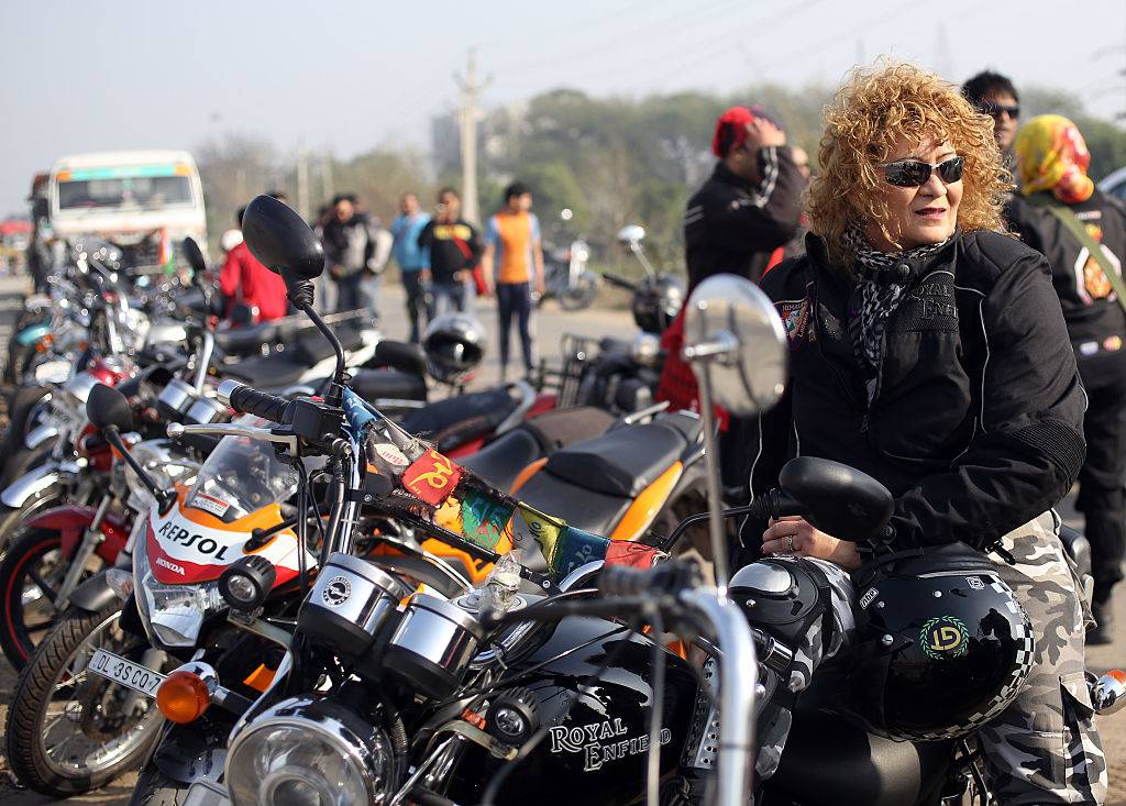 a woman on a motorcycle