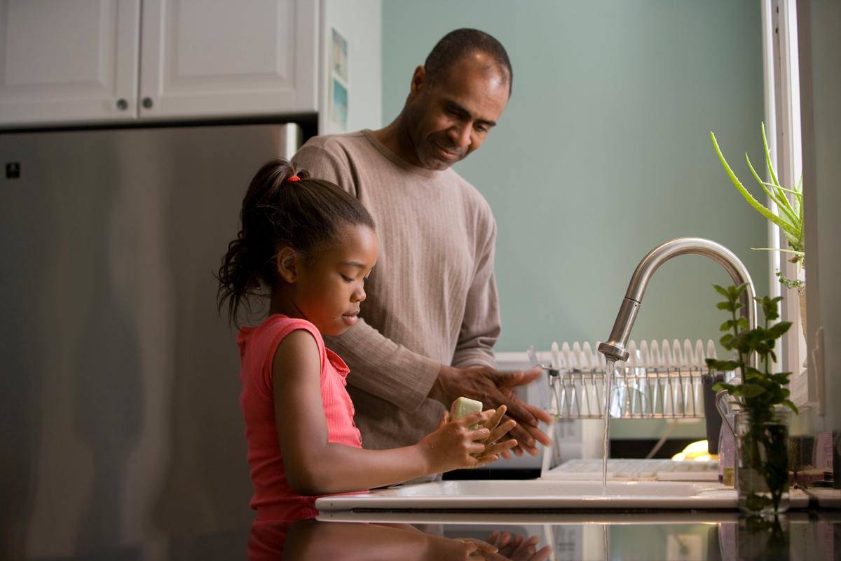 girl and dad in kitchen