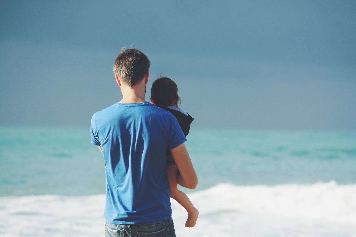 dad and daughter ocean