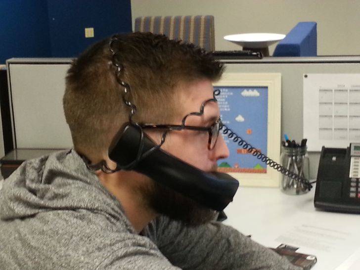 phone wrapped around head at work