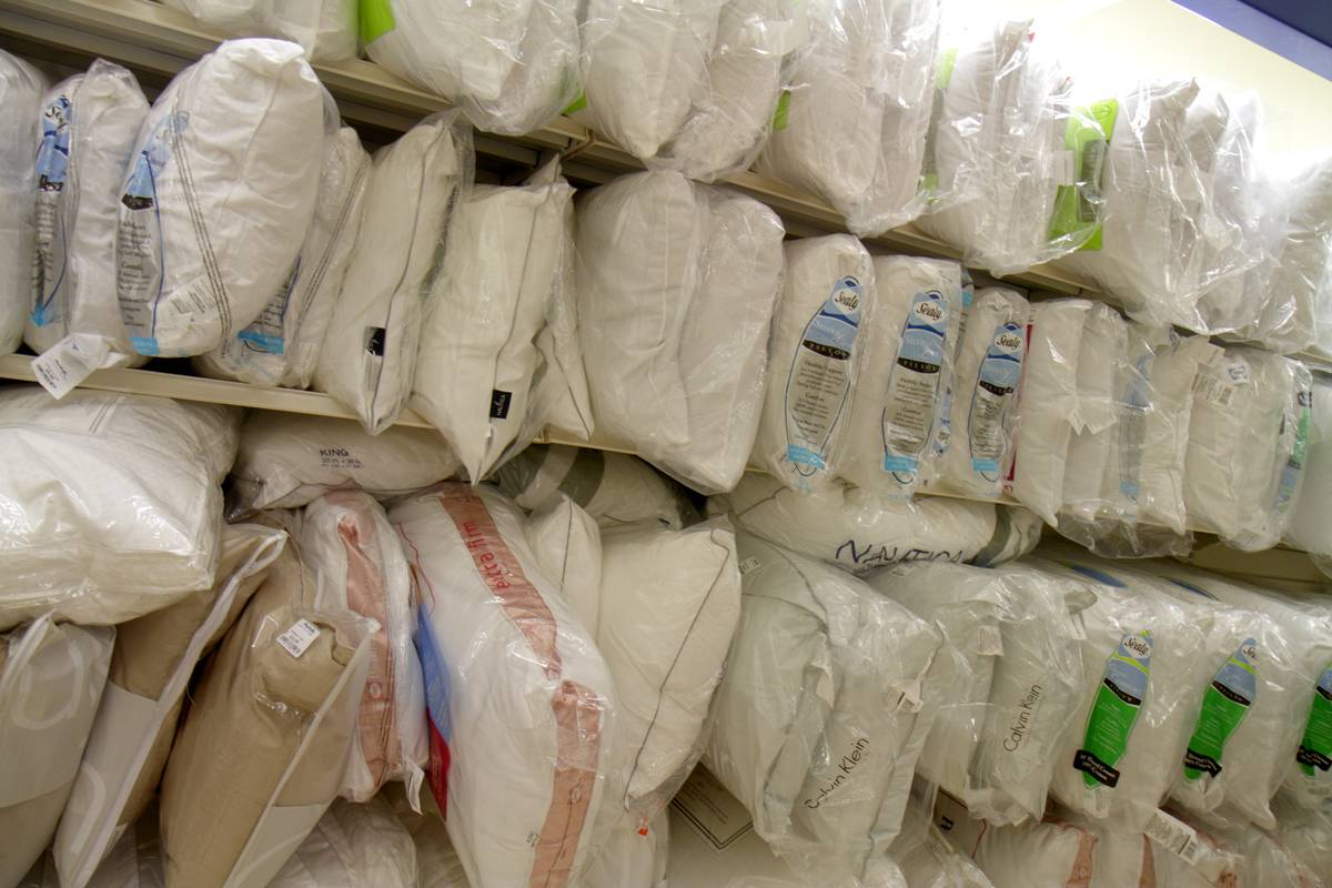 Pillows for sale are on store shelves.