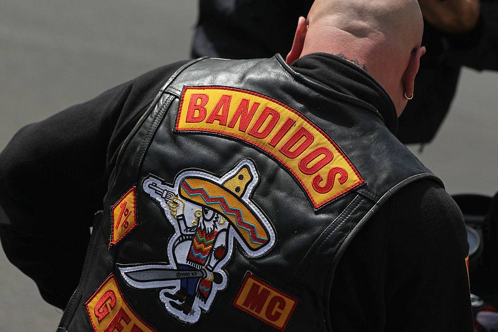 A member of the Bandidos motorcycle gang sits on his motorcycle
