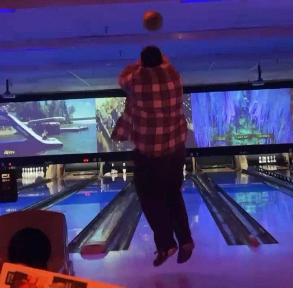 shooting bowling ball like basketball at the bowling alley