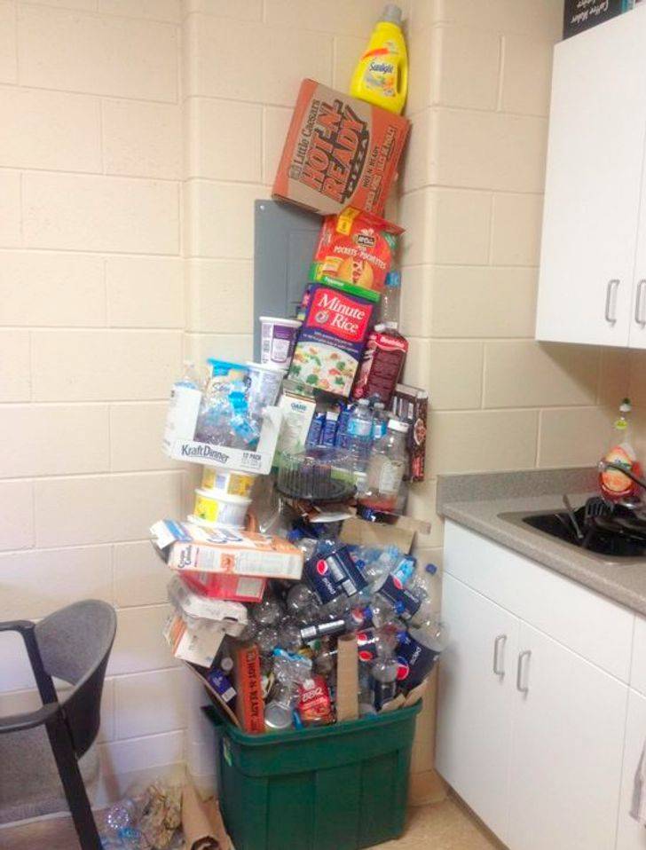 trash piled high in the bin