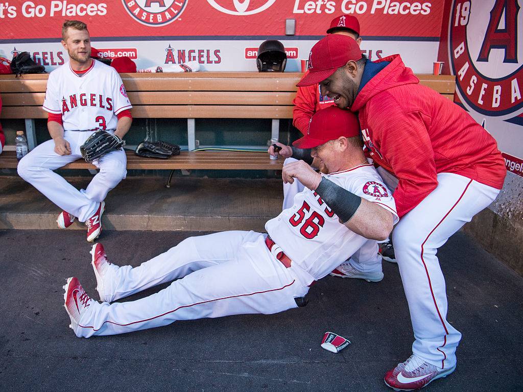 baseball players doing a trust fall exercise