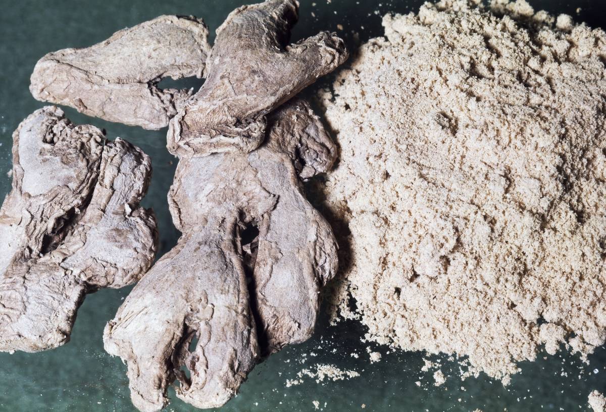 Ginger is seen whole and ground into a powder.