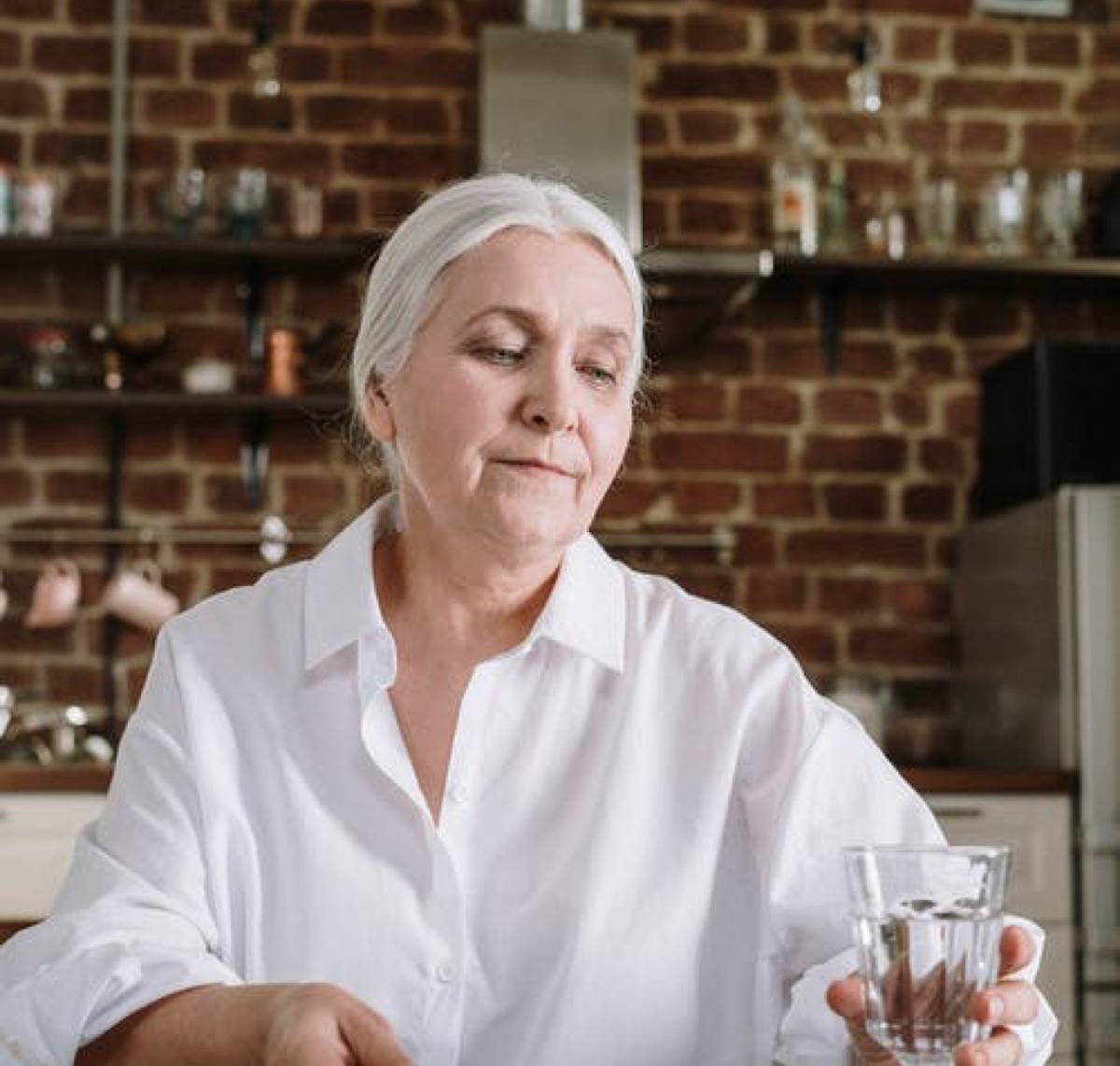 older woman looking down