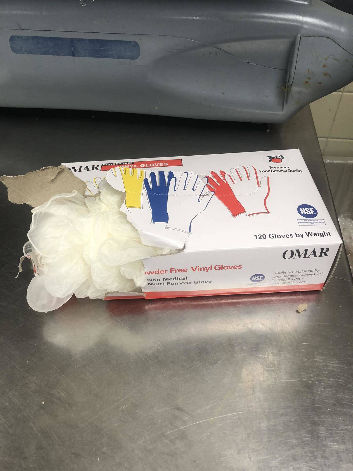 Box of latex gloves ripped apart