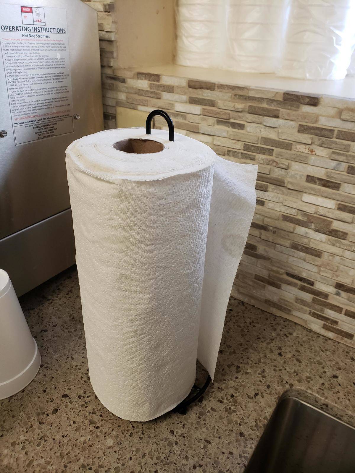 Paper towel roll on holder smashed through the roll instead of the cardboard tube