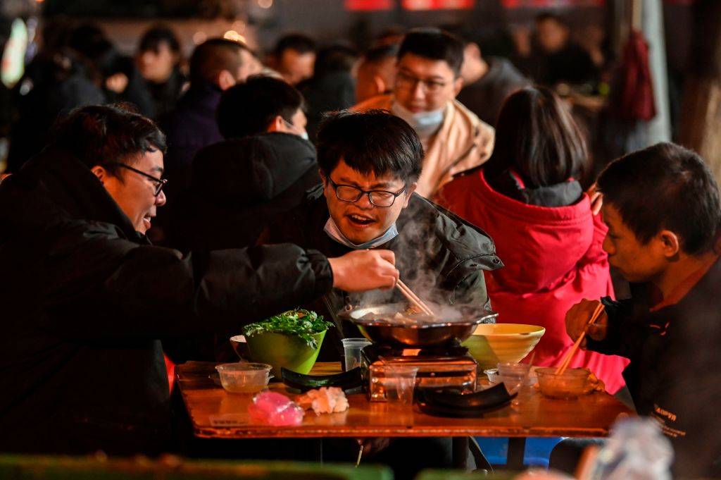 people eating at a restaurant in China