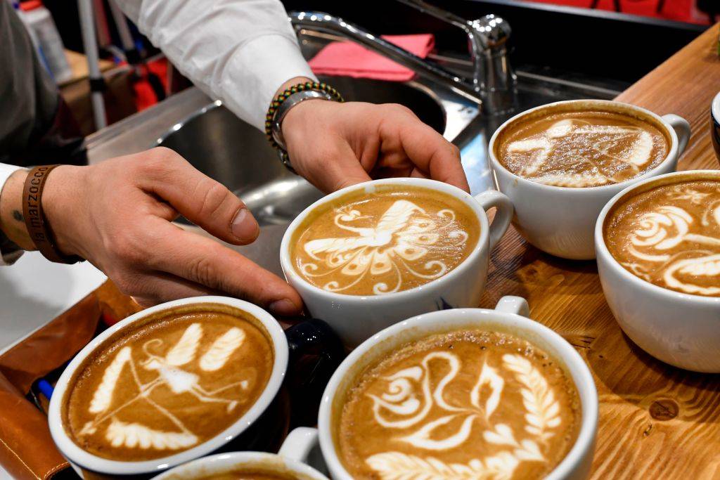 cappuccinos with floral designs