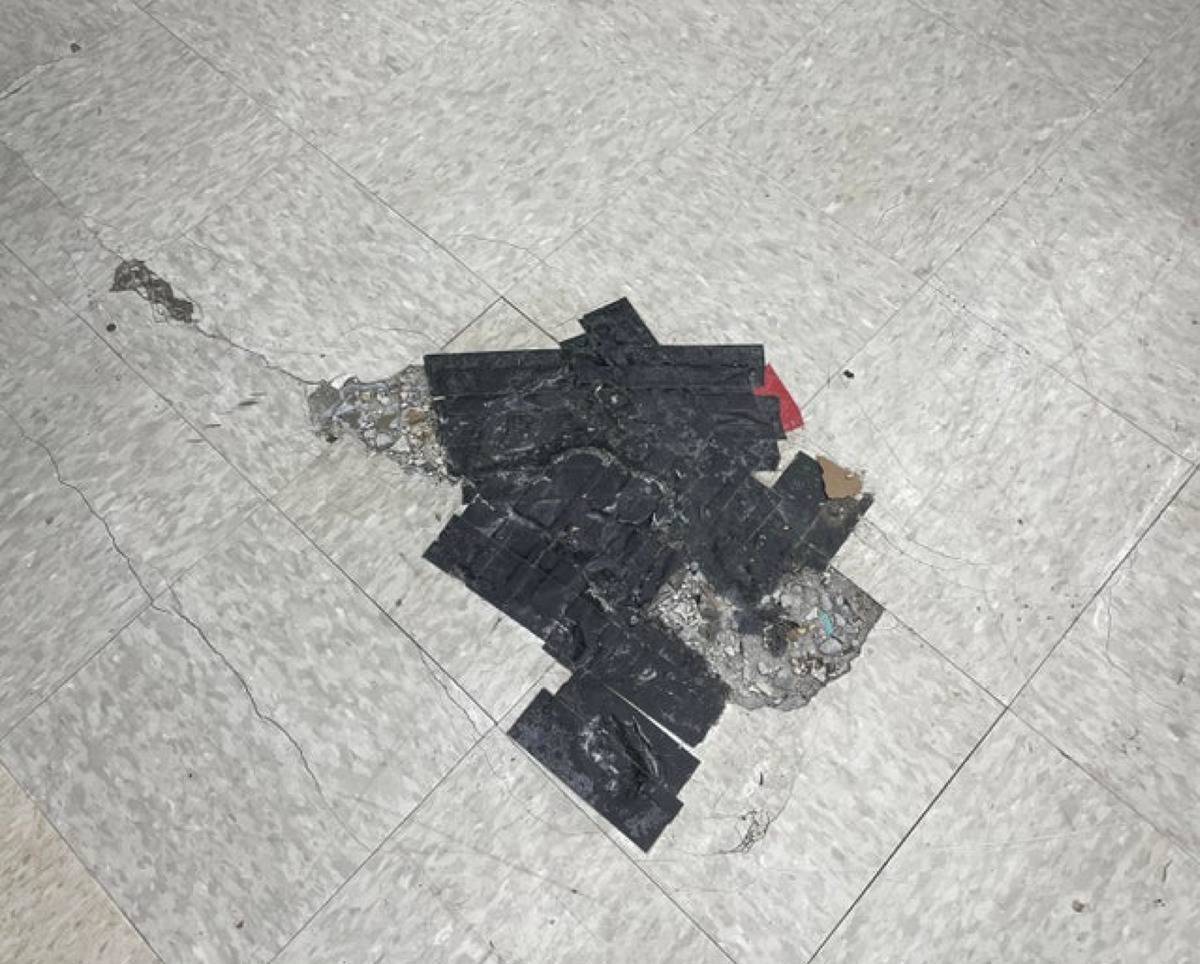 floor crack covered with tape