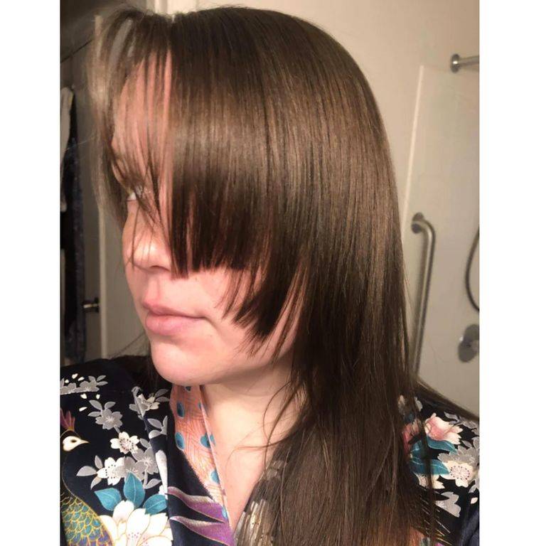 Woman with a very uneven haircut