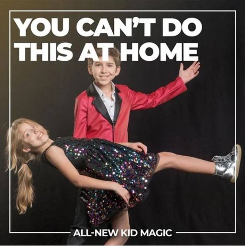 two kids performing bad magic trick