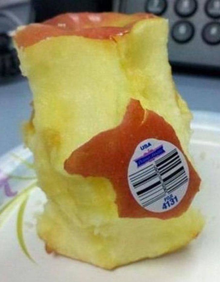 person ate around the sticker on their apple