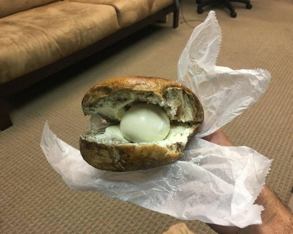 whole hard boiled egg in center of bgel
