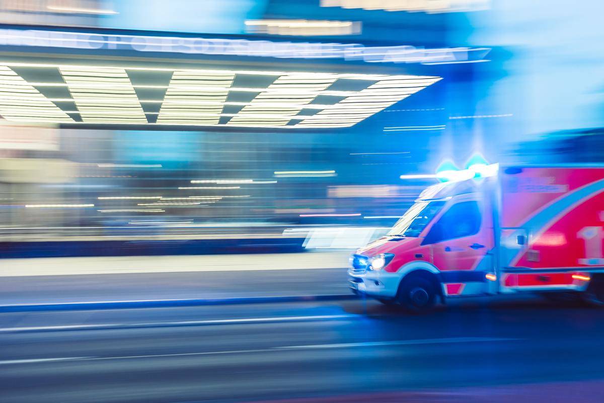 Ambulance racing to hospital in a blurry exposure picture