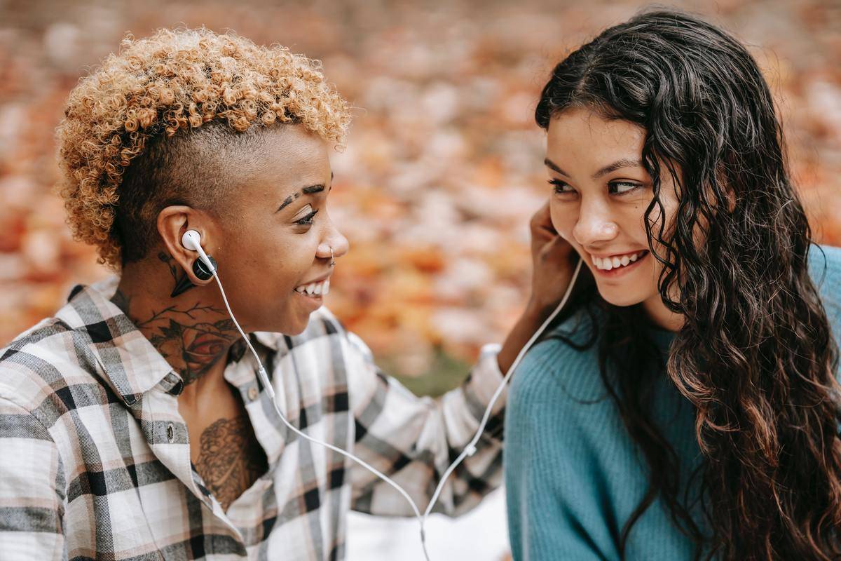 People listen to music and look at each other