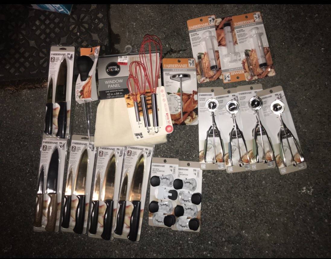 Kitchen supplies in packages laid out on the table. 