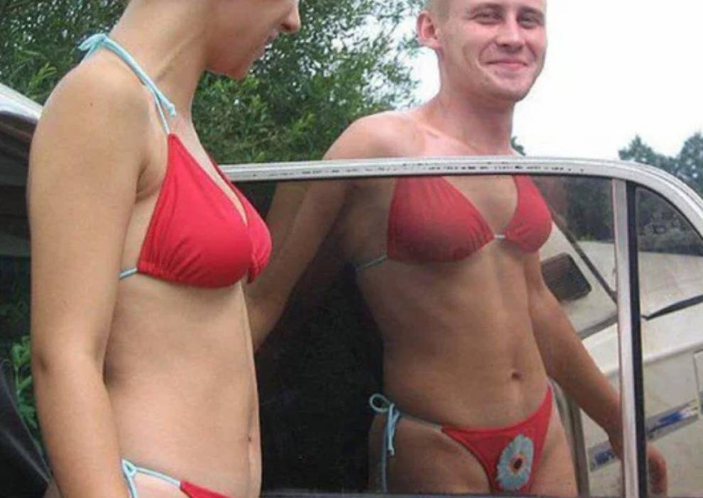 reflection makes man look like he has a bikini on